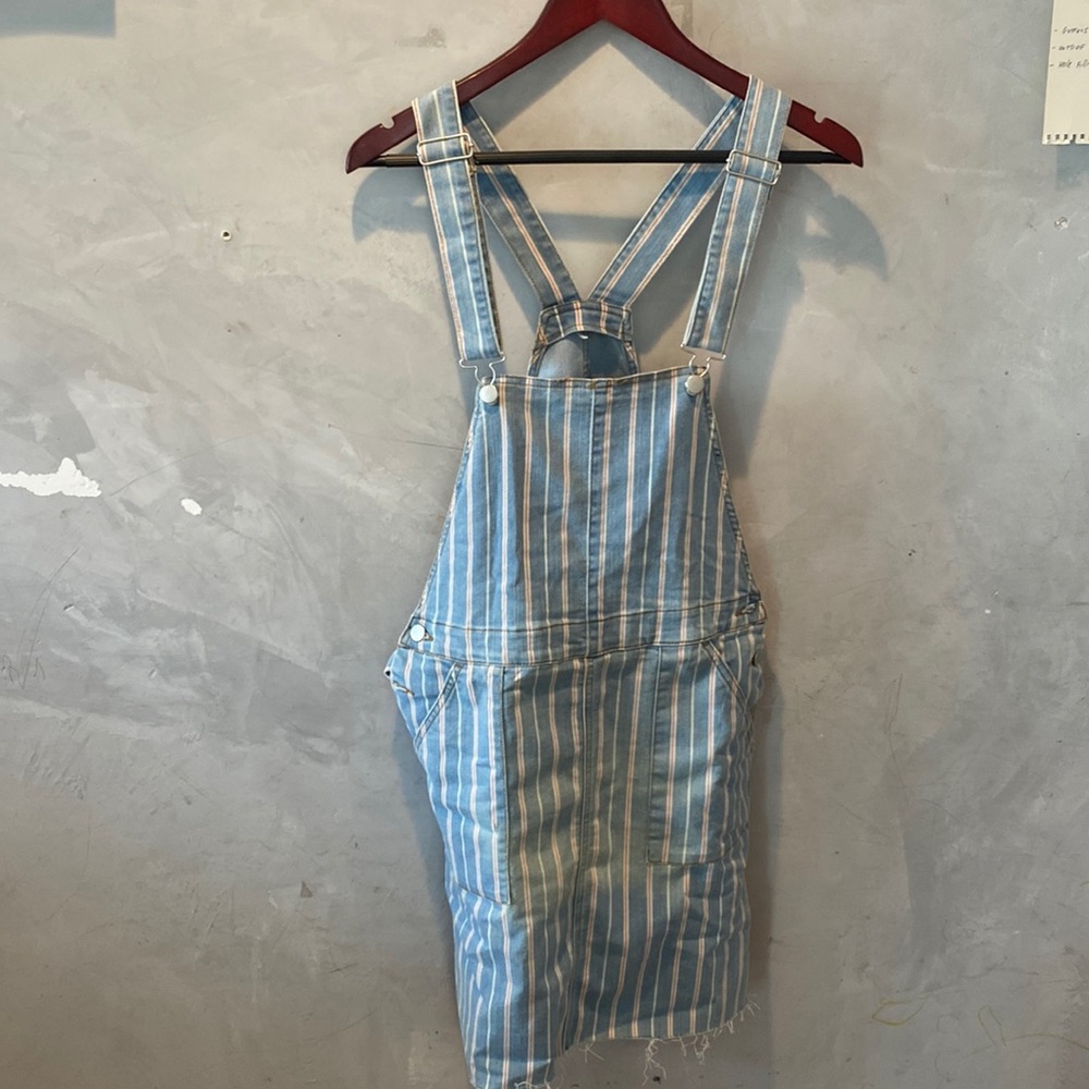Summer is making its way in! Boho chic striped denim pinafore w/ raw hem.  Cute.
